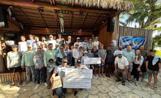 Jupiter Inshore Classic Fishing Tournament group photo at Guanabanas waterfront restaurant and bar. Fisherman caught snook, jacks and exotics on the Jupiter waterways.