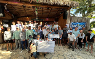 Jupiter Inshore Classic Fishing Tournament group photo at Guanabanas waterfront restaurant and bar. Fisherman caught snook, jacks and exotics on the Jupiter waterways.