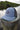 Blueline OG UV Lite Hat in Slate and Navy with signature patch on dock in Jupiter Florida – front view
