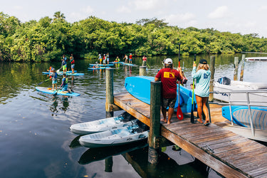 Blueline Surf and Paddle Kayak and Paddle Board Rental Dock in Jupiter Florida at Guanabanas Waterfront Bar and Restaurant. 