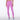 A model wearing high-waisted, full-length athletic leggings in a solid medium pink color.