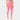 A model from the back wearing bright pink high-waisted leggings.