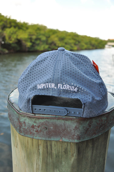 Rear view of Blueline Kids Surfboard Tech Hat showing adjustable snapback closure and lightweight construction.