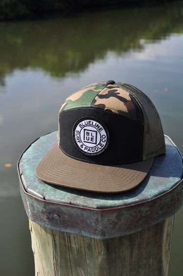 OG Blueline black camo loden flat bill hat on dock in Jupiter Florida