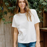 Woman wearing the Outerknown Saltwater Slub Tee made from Regenerative Organic Certified® cotton with a relaxed fit and lightweight slub texture.