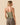 Woman wearing an Outerknown Sojourn Island Lea tank top back view