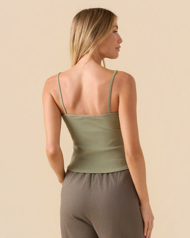 Woman wearing an Outerknown Sojourn Island Lea tank top back view