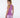 A woman shown from the back wearing a fitted sleeveless athletic tank top.