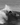 Surfer on the face of a wave on the Starboard Twin Fin in Acute Carbon