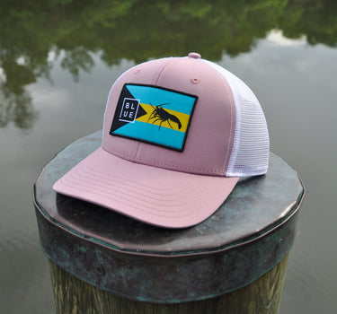 Bahamas Lobster Eco Hat in dried rose and white displayed waterfront in Jupiter Florida