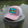 Bahamas Lobster Eco Hat in dried rose and white displayed waterfront in Jupiter Florida