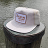 Stone colored Beacon Lightweight Cotton Rope Hat from Blueline Surf & Paddle Co. featuring classic rope detail and custom surf shop patch inspired by the Jupiter Florida coastal lifestyle.