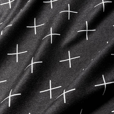 Black fabric with white cross patterns