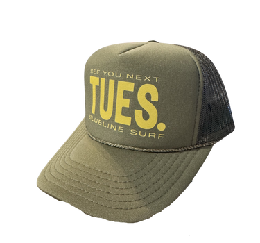 The official Blueline 2026 TNRL See You Next Tuesday Foam Hat in the surf shop in Jupiter, Florida, featuring the limited-edition race league graphic front panel and breathable mesh backing.