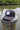 Black Blueline FlexFit performance hat featuring the embroidered Blueline Circle Logo, designed for boating, golf, paddleboarding, fishing, and outdoor adventures in Jupiter, Florida.