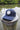Navy Blueline FlexFit performance hat featuring the embroidered Blueline Circle Logo, designed for boating, golf, paddleboarding, fishing, and outdoor adventures in Jupiter, Florida.