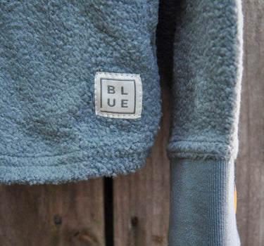 Pocket and hem detail on the Blueline Women's Kami Fleece Button Down