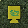 Yellow neoprene Blueline jumping mahi logo koozie displayed on grass