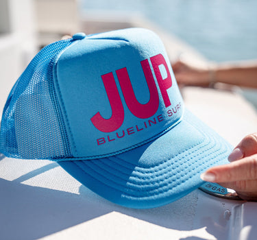 Blueline Surf JUP Foam Trucker Hat in bright blue with hot pink JUP logo and mesh back – Otto snapback cap from Jupiter, Florida surf shop.