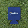 Navy neoprene Blueline Jupiter Lite koozie with light lettering displayed on grass