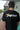 Man wearing a black Blueline Jupiter T-shirt in Jupiter, Florida.