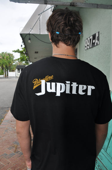 Man wearing a black Blueline Jupiter T-shirt in Jupiter, Florida.