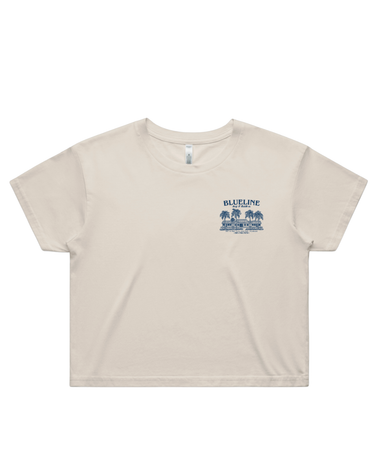 Front view of Blueline Jupiter Shop Crop T-Shirt in bone with pale navy Jupiter shop artwork.