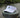 Blueline Lighthouse Visor in White featuring the embroidered Jupiter Lighthouse logo, designed for paddleboarding, boating, golf, and everyday coastal living.