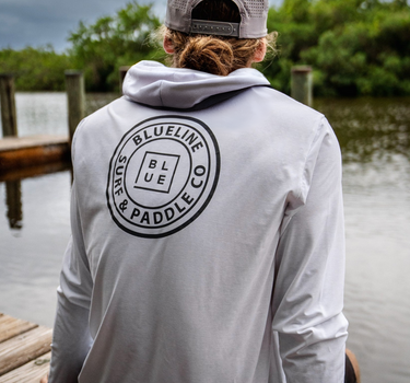 Blueline OG Circle UV Sun Hoodie – White / Gray, worn on a dock in Jupiter, Florida