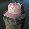 Blueline Skiff rope hat in dried rose photographed along the Intracoastal in Jupiter Florida