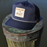 Blueline Skiff rope hat in twilight navy photographed along the Intracoastal in Jupiter Florida
