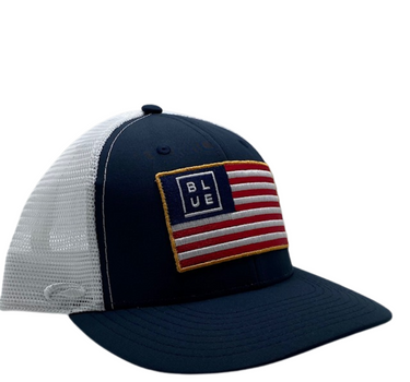 Front view of the Blueline USA Flag Performance Hat in Navy and White with embroidered American flag patch.