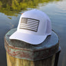 Blueline USA Flag Performance Hat in White and Charcoal featuring a tonal embroidered American flag patch with breathable perforated side panels.