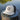 Blueline Vintage Circle Performance Hat in Stone and Navy featuring the Vintage Circle patch with breathable perforated side panels.
