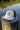 Blueline Vintage Circle Performance Hat in Stone and Navy featuring the Vintage Circle patch with breathable perforated side panels.