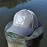 Blueline vintage circle patch trucker hat in CityScape grey with stone mesh photographed in Jupiter Florida