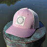 Blueline vintage circle patch trucker hat in dried rose with stone mesh photographed in Jupiter Florid