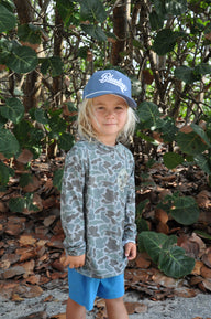Blueline Vintage Youth Hooded UV Sun Shirt in Duck Camo providing lightweight sun protection for kids during fishing, boating, beach days, and outdoor adventures.