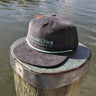 Blueline corduroy hat in charcoal with seafoam embroidery photographed along the Intracoastal in Jupiter Florida