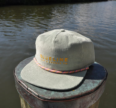 Classic Blueline Cord Hat in Quarry with multicolor rope and embroidered logo on dock in Jupiter Florida