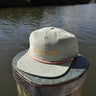 Classic Blueline Cord Hat in Quarry with multicolor rope and embroidered logo on dock in Jupiter Florida