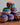 Colorful woven hacky sacks from Blueline Surf & Paddle Co. featuring assorted random patterns and coastal-inspired designs for beach days, travel, and outdoor fun.