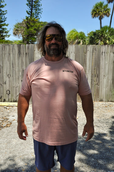 Front view of peach FLOMO x BL Wave T-Shirt from Blueline Surf & Paddle Co. featuring soft lightweight fabric and relaxed coastal styling