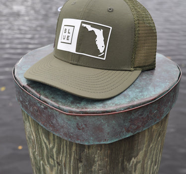 Florida Box Performance Hat in olive featuring the signature Florida Box patch and lightweight UV Lite performance construction.