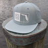 Florida Box UV Hat in quarry gray with white logo by Blueline Surf & Paddle Co., featuring BL/UE Florida patch on breathable snapback performance hat.