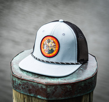 Florida Seal Performance Hat in quarry and black featuring the Blueline Florida Seal patch and lightweight UV Lite performance construction