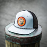 Florida Seal Performance Hat in quarry and black featuring the Blueline Florida Seal patch and lightweight UV Lite performance construction