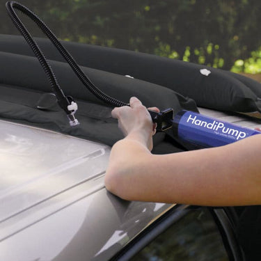 Detail shot of the included HandiPump and the high-performance inflation valve on the HandiRack inflatable crossbars