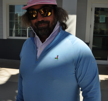 Johnnie-O × Blueline Freeborne Quarter Zip Maliblu lightweight performance pullover in Jupiter Florida coastal setting