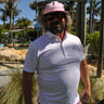 Johnnie-O × Blueline Marina Polo Punch performance golf polo inspired by the Jupiter Florida coastal lifestyle